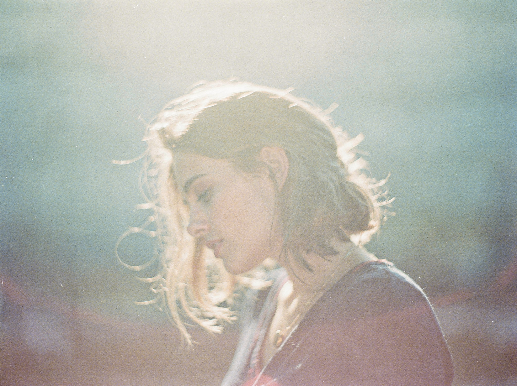 AI-generated hazy backlit portrait with a glowing hair halo