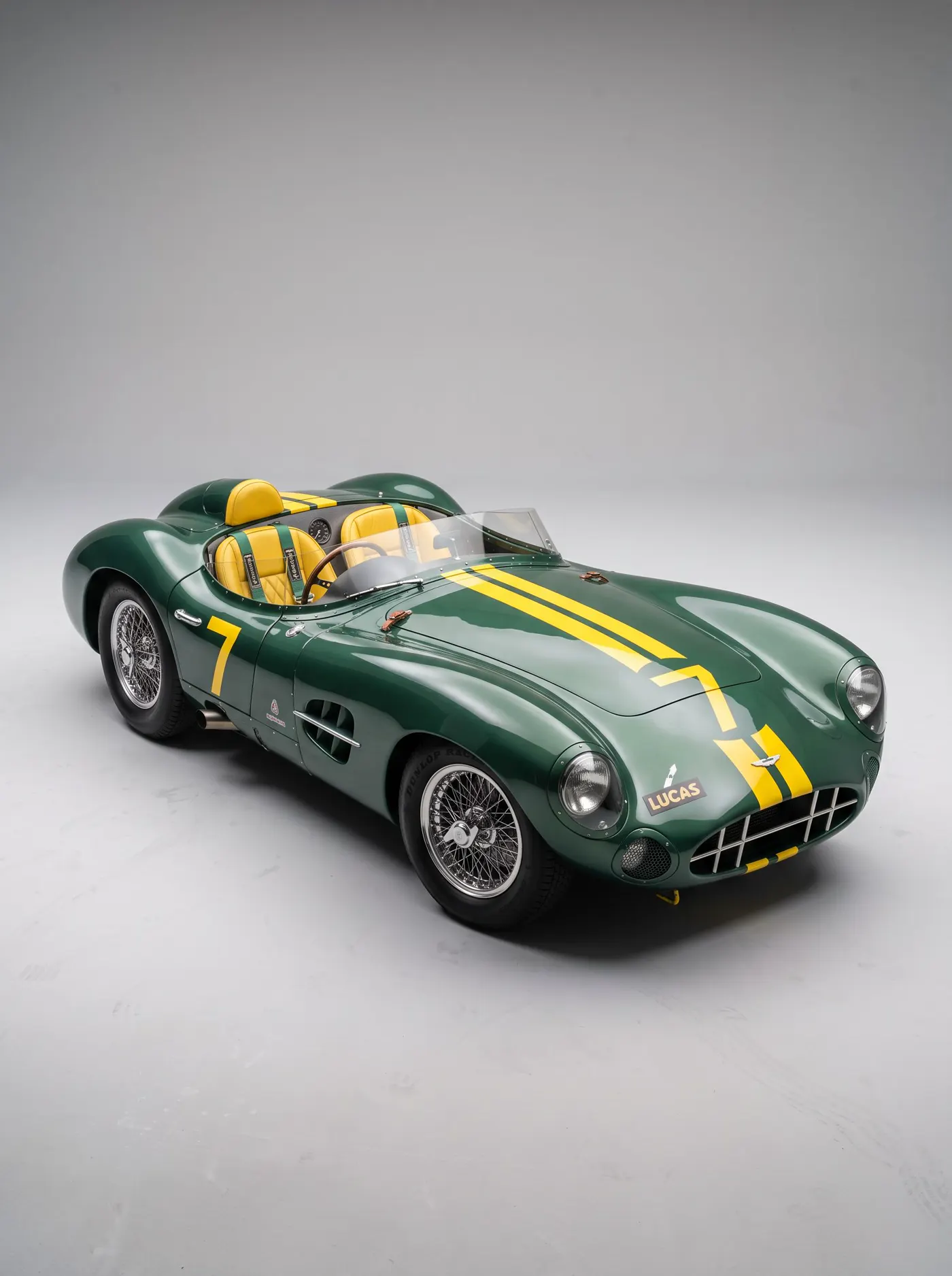 British racing green vintage speedster in a studio