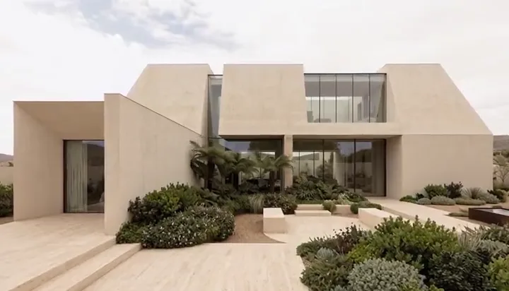Modern minimalist villa with desert landscaping